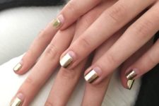 12 negative space and gold foil nails are great for a party