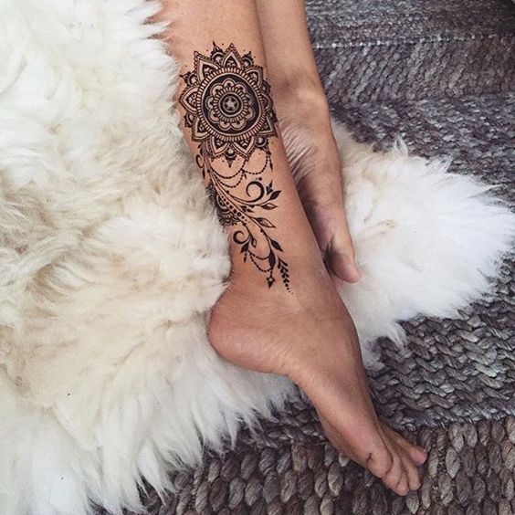 gorgeous mandala leg tattoo