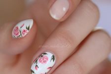 14 nude manicure with two white and pink rose nails