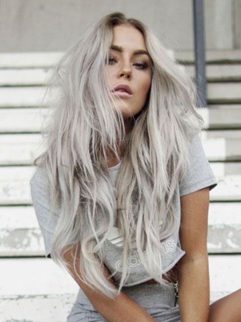 long blonde grey hair with waves and a cool hair cut