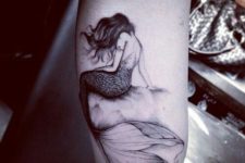 18 cool mermaid tattoo on an arm looks very romantic