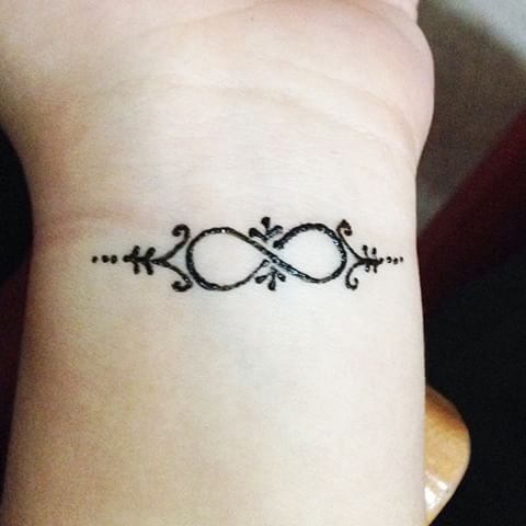 the eternity sign on a wrist for a try