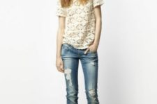 With lace shirt and distressed jeans