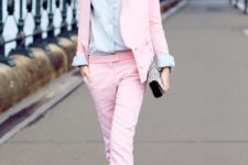 With light blue shirt, pale pink trousers, black sandals and leopard clutch