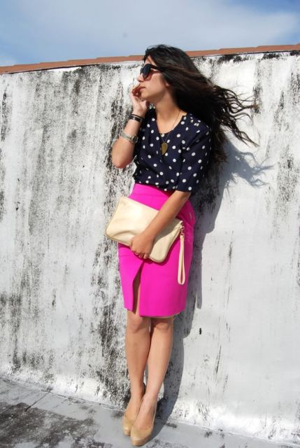 With polka dot blouse, neutral clutch and shoes