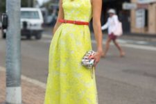 With red belt, printed mini clutch and polka dot shoes