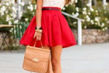 With white lace shirt, red skirt and leather bag