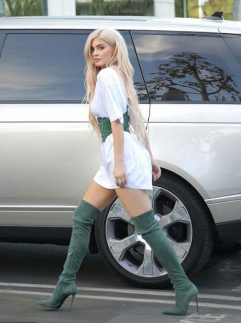 With white long t-shirt and over the knee boots