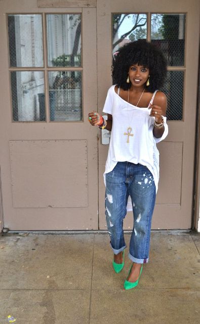 With white loose top and distressed jeans