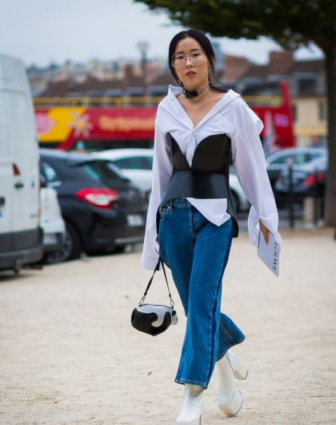With white shirt, crop jeans, white platform boots and mini bag