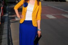 With white shirt, yellow blazer and blue shoes