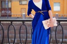 With white t-shirt, cobalt blue cardigan, pale pink clutch and shoes