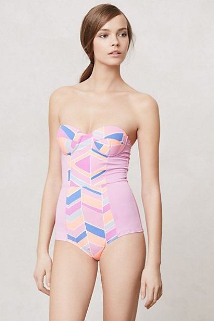 pink one piece swimsuit with geometric decor and a strapless top