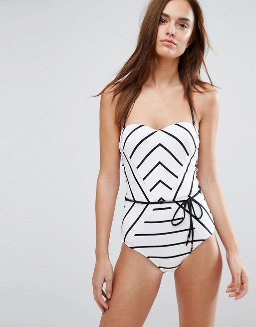 striped black and white one piece swimsuit with a sash