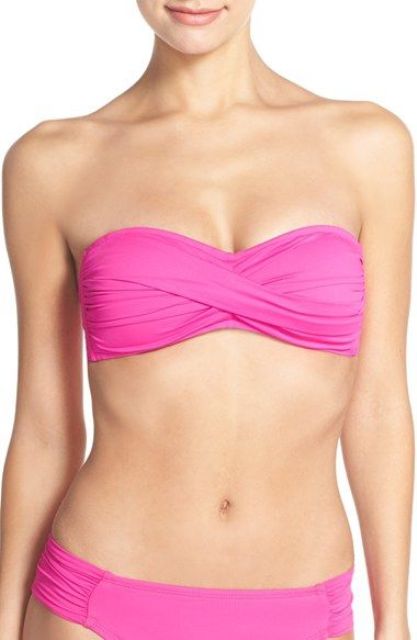 bold pink swimsuit with a draped bandeau top