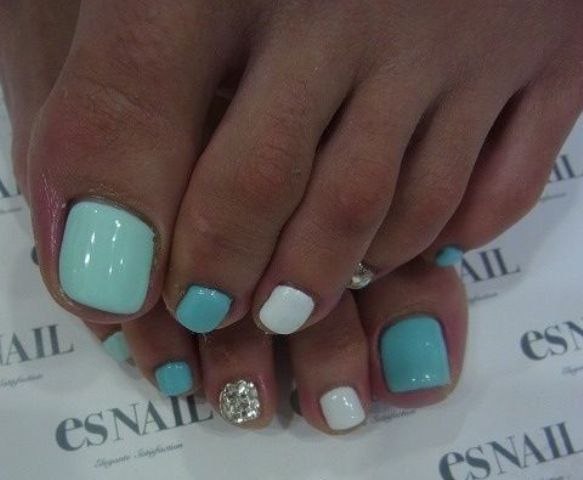 turquoise, aqua, white and silver nails can be rocked at a beach party
