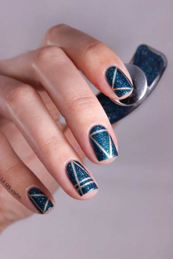 blue glitter nails with silver stripes