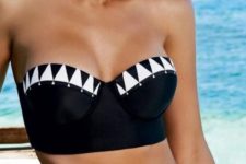 17 black and white swimsuit with a geometric print and a bandeau corset style top