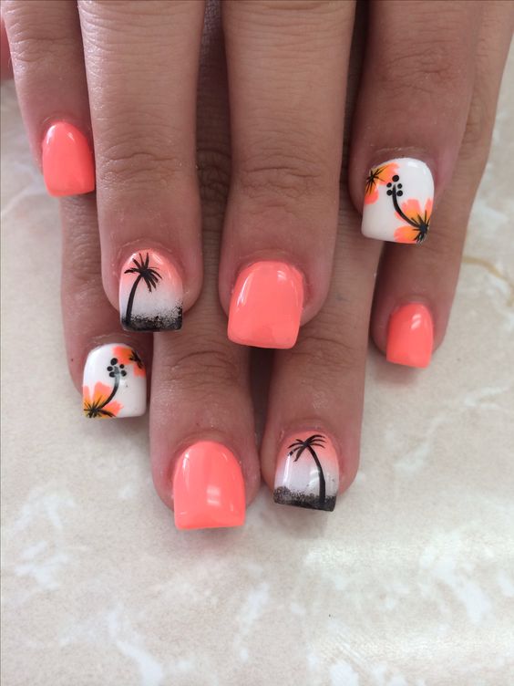 orange nails and accent ones with palm trees and tropical flowers