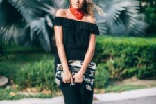 With black lace up flats, printed clutch and red scarf