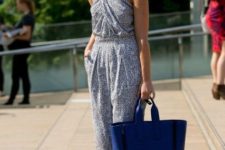 With blue tote and thin strap sandals