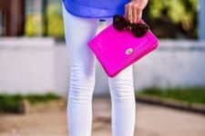 With cobalt blue top, white pants and hot pink clutch