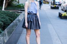 With metallic mini skirt and nude pumps