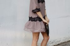 With mini dress and black clutch