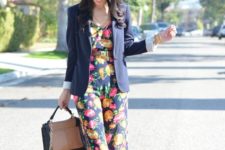 With navy blue blazer and two color bag