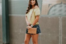With off the shoulder blouse, brown bag and beige shoes