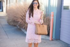 With pale pink lace dress and camel tote