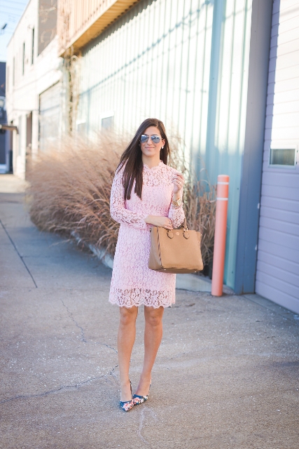 With pale pink lace dress and camel tote