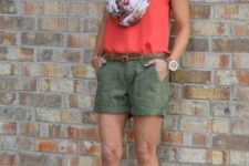 With pink shirt, printed scarf and beige sandals