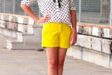 With polka dot blouse, white shoes and black necklace