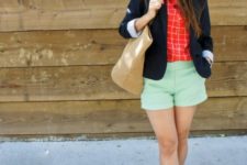 With red shirt, navy blue blazer, beige tote and sandals