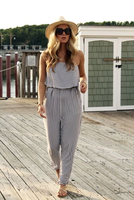 With straw hat and flat sandals