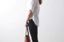 With white button down shirt, brown tote and skinny jeans