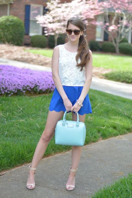 With white lace top, mint bag and sandals