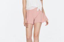 With white top and pale pink sandals
