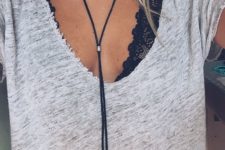 02 a black lace bralette under an oversized greey t-shirt with a choker looks wow