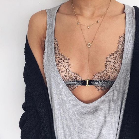 a semi sheer bralette with an oversized top and a cardigan