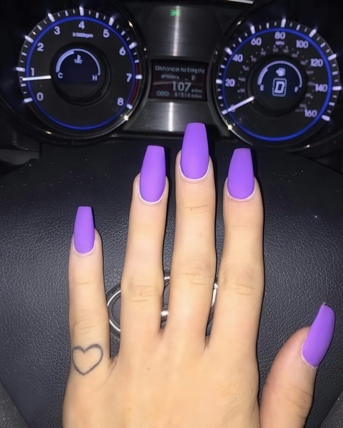 matte purple nails look very bold and chic