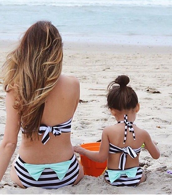 black and white striped two piece bathing suits with aqua bows