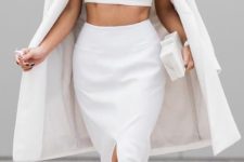 07 a white sleeveless crop top and a pencil skirt with a front slit, a white summer coat