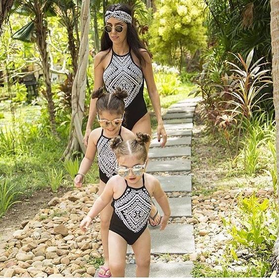 black one piece swimsuits with a tribal print for all the girls