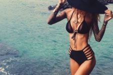 09 black bikini with a half sheer top and a high waist side strap bottom
