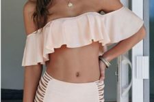 10 blush off the shoulder swimsuit with a urffled top and a strappy high waist bottom