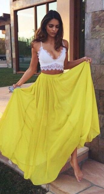 a yellow maxi skirt and a white lace bralette for an effortlessly sexy look