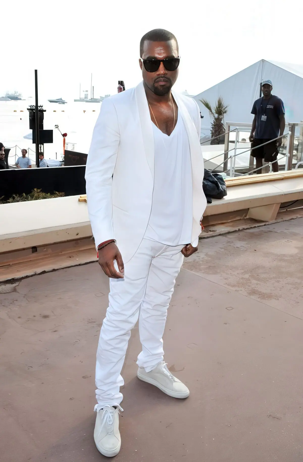 white jeans, a white tee, a white jacket and neutral sneakers