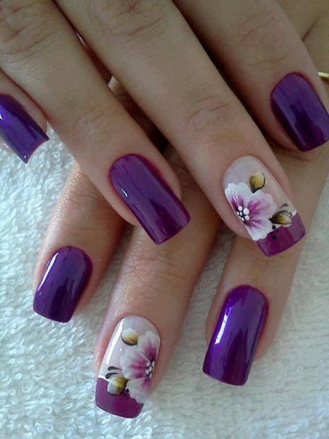 purple nails with large scale floral designs